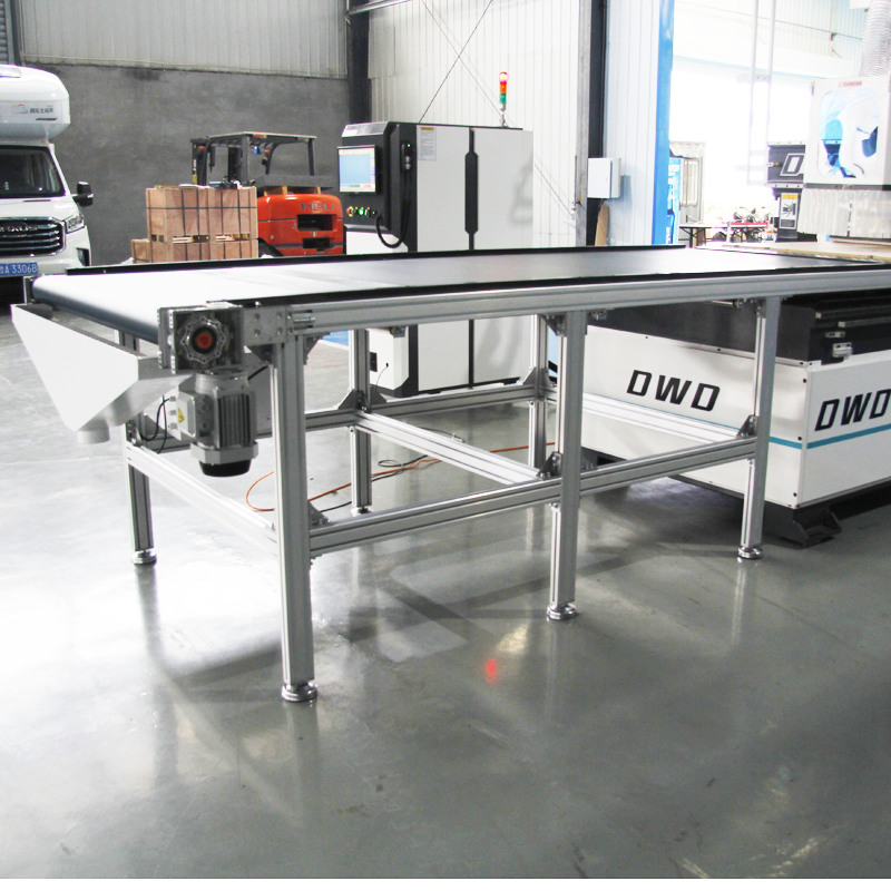 CNC router machine processing wooden furniture parts in a modern woodworking shop